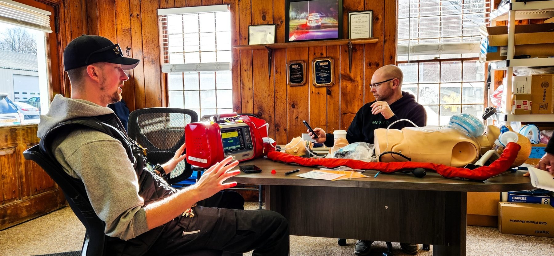Former Chief Stephen Brucato and Chief of Operations Steve Near working with a Hamilton T1 during training